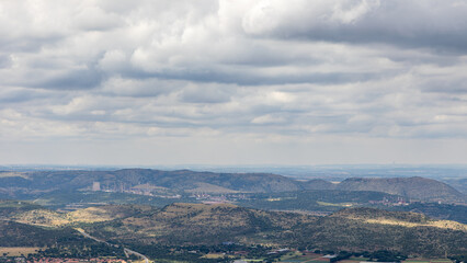Fototapeta premium A repurposed uranium enrichment plant called Valindaba or Pelindaba East which once produced a number of nuclear weapons, seen in the distance from the Magaliesberg near Johannesburg in South Africa.