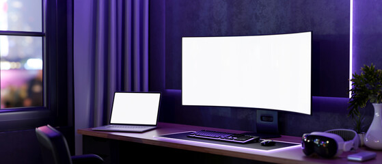 White screen computer and laptop with headset on wooden table with neon purple monitor backlighting.