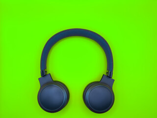 Dark green big headphones on a plain bright green background for banners, for advertising. copy...
