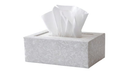A white tissue box with white tissues sticking out against a black background in a studio shot
