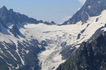 glacier in the mountains of the North Caucasus in Dombay