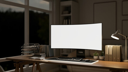 White screen computer and document folders aside lamp on wooden working table in dim lit living room