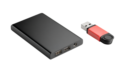 A close up of a black power bank and a red usb flash drive on a black background in a studio setting