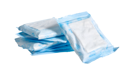 A stack of individually wrapped sanitary pads with blue packaging on a black background close up view
