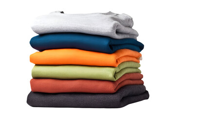 A stack of folded colorful shirts neatly piled on top of each other against a black background space