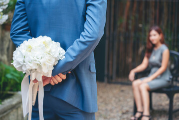 Surprise proposal young couple lover boyfriend give flower Bouquet to beautiful girlfriend to will...