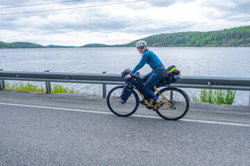 Girl on a touring bike with bags