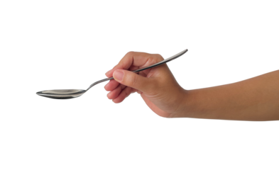 female hand holding a spoon