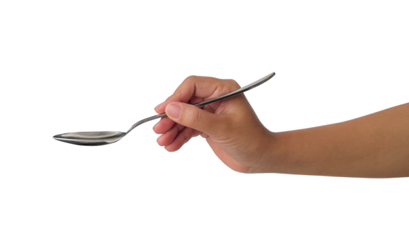 female hand holding a spoon
