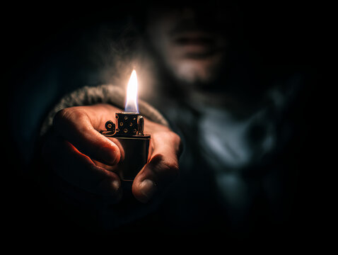 hand holding lighter