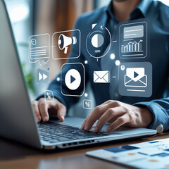 Person working on a laptop with digital marketing and advertising icons overlayed, including megaphone, ad, email, video play button,