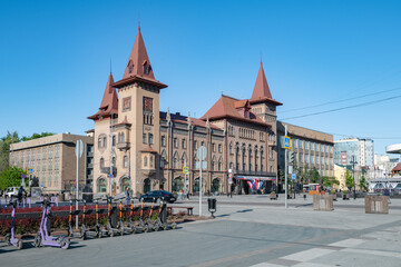 The building of the Saratov State Conservatory in the urban landscape on a sunny May day