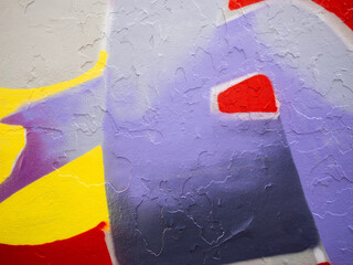 colorful abstract graffiti pattern, many layers of paint on the wall. graffiti texture
