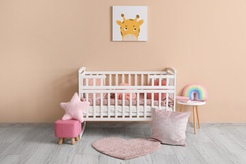 Interior of stylish baby room with comfortable crib