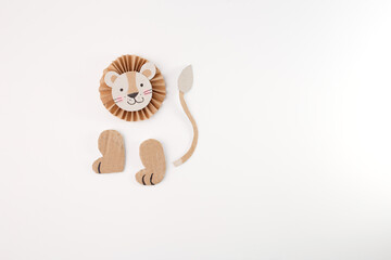 craft project paper lion parts details made from simple materials, for a kids art activity or...