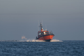 MARITIME TRANSPORT - A pilot boat sails on the sea