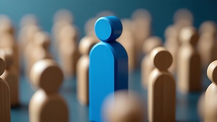 A blue figure stands out from a crowd of wooden figures on a blue background in a blurry scene