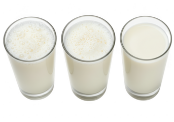 Three glasses of milk showcase varying levels of foam isolated on transparent background