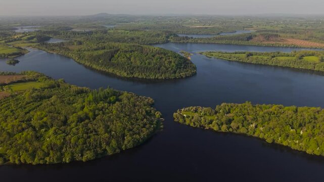 Lough oughter, surrounded by lush greenery in county cavan, ireland, aerial view