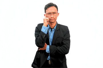 Asian businessman standing showing a thinking expression