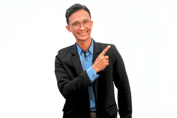 Asian businessman standing smiling confidently pointing up