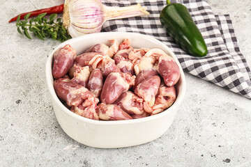 Fresh raw chicken hearts in the bowl