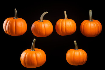 Pumpkin levitation, Halloween or harvest theme, dark background.