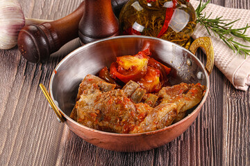 Baked lamb ribs with vegetables