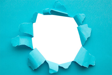 Torn ripped blue paper hole isolated on white background