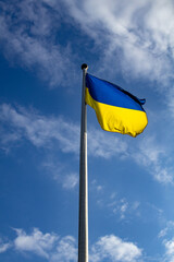 flag of ukraine on blue sky