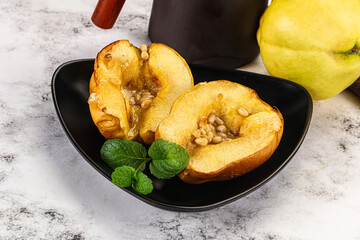 Baked quince with honey and cedar