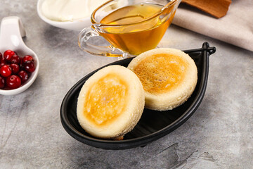 Roasted cheesecakes - Syrniki with honey