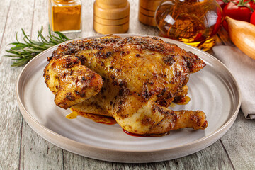 Baked in oven whole chicken with spices