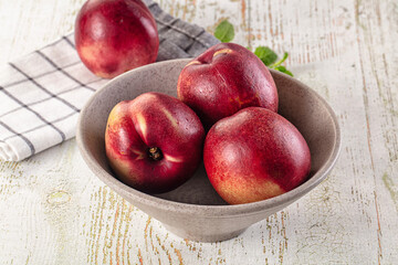 Ripe sweet juicy nectarines heap