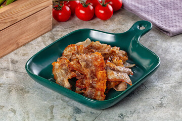 Fried crispy pork bacon snack