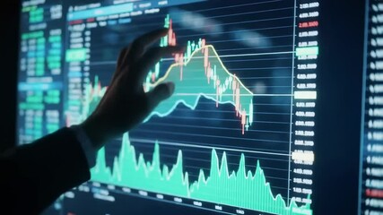 Hand interacting with financial data on large interactive display - Powered by Adobe
