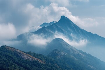 Hilly landscape view shrouded in mist, sky background for travel and adventures