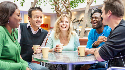 Adult Education: Friends Together. A group of mature students enjoying each others company and a break from their studies. From a series of related images.