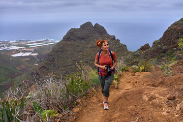 Hiker above Roque Dos Hermanos