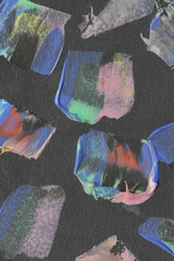 Colorful abstract brushstrokes on dark paper background. Vibrant acrylic or oil paint texture for...