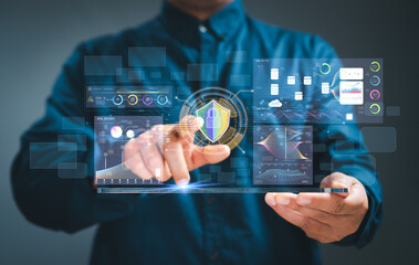 Concept Data Protection Cyber security. Businessman's hand Lock and shield icon work on virtual...