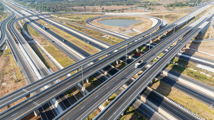 Drone shot aerial view of high angle view of intersection across the bridge against the countryside...