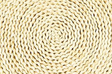 Brown wicker table mat background. Straw round tray, flat lay, copy space. 