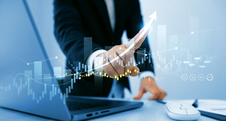 Businessman draw growth graph and investment analysis.Analysis finance grow graph and market investment. Financial business plan,earnings,sale and strategy. Stock market chart, exchange financial grow