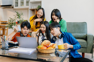 Fototapeta premium Lifestyle people. happy people of college students excited overjoyed examination results with good news over smartphone or Laptop computer.