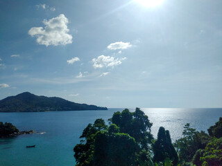 Scenic View of the Beautiful Sea and Blue Sky with White Clouds from a Viewpoint in Phuket, Thailand