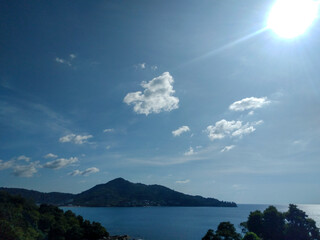 Scenic View of the Beautiful Sea and Blue Sky with White Clouds from a Viewpoint in Phuket, Thailand