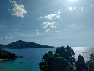 Scenic View of the Beautiful Sea and Blue Sky with White Clouds from a Viewpoint in Phuket, Thailand