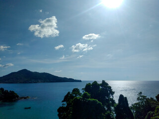Scenic View of the Beautiful Sea and Blue Sky with White Clouds from a Viewpoint in Phuket, Thailand