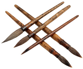 Several art brushes, varying sizes and shapes, arranged in a criss-cross pattern.  Wooden handles with intricate wood grain.  Dark-tipped brush bristles